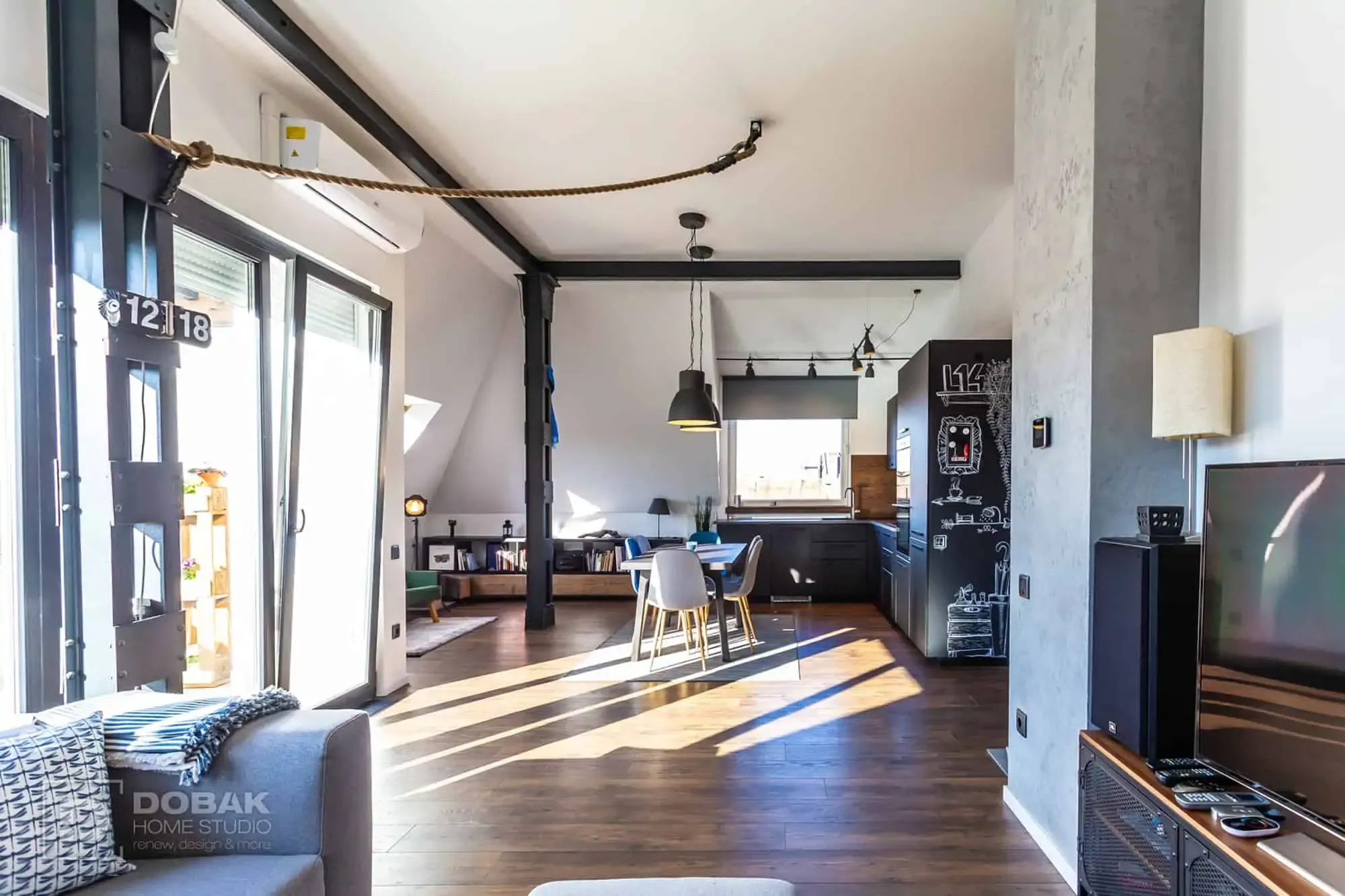 Felújított, tetőtéri loft nappali és konyha a Lehel Loftban